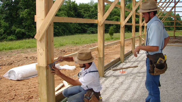 Amish barn builders working on new project
